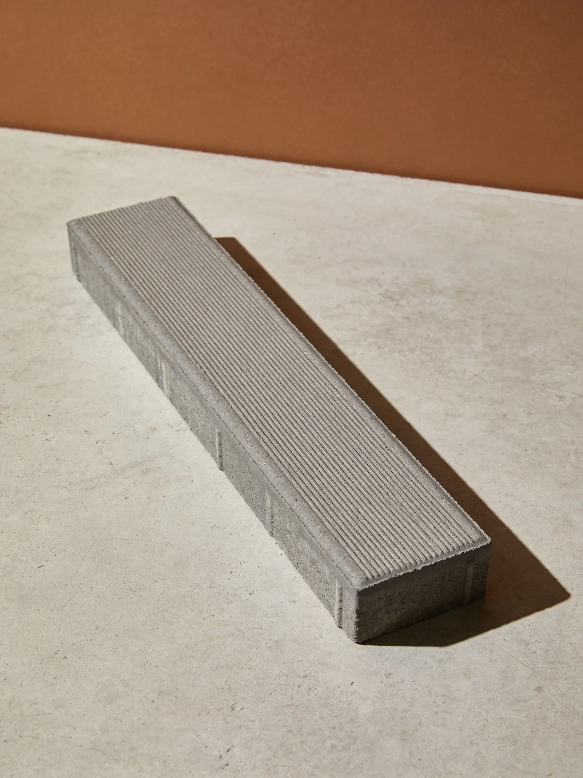Broom rectangle slab — long rectangular slab with fine parallel broom texture